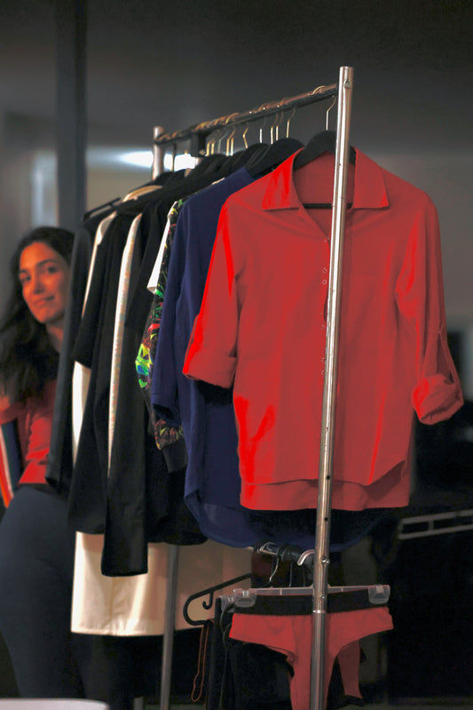 Sanaz In-house Fashion Creative Director for ELZI. Custom clothes that meets your demand and prolong the life of your existing go to clothes. Visible on the picture are linen shirts, merino underwear for men and women, merino t-shirt, raincoat.
