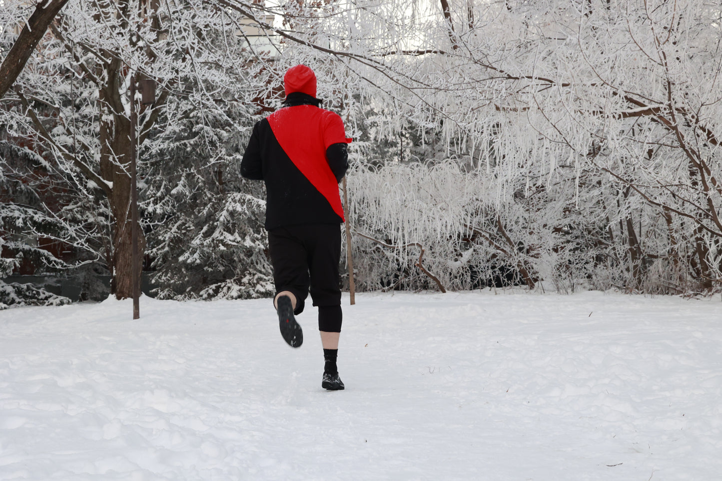 Course sur neige à Verdun, Montréal. Le model porte les shorts ELZi Cryo Thermal Experience.