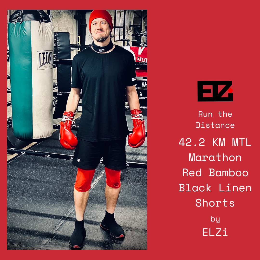 Jonathan wears the 42.2KM mtl marathon black linen with red bamboo liner shorts for boxing at counterback studio in Montreal.