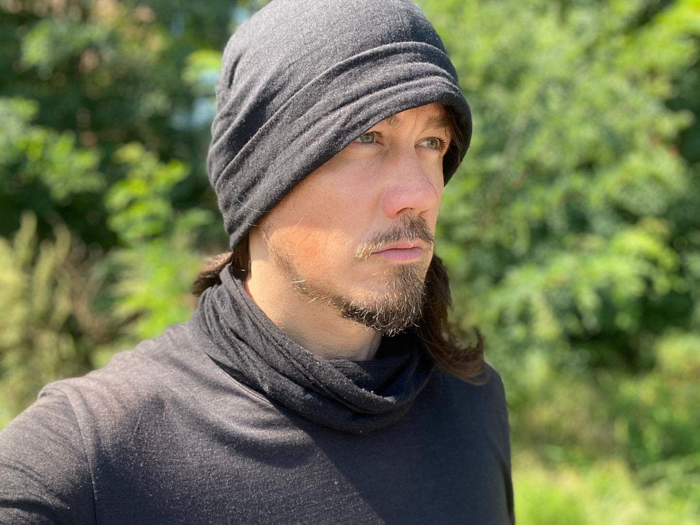 Jonathan Brunelle wears a black merino wool buff made by ELZI.ca