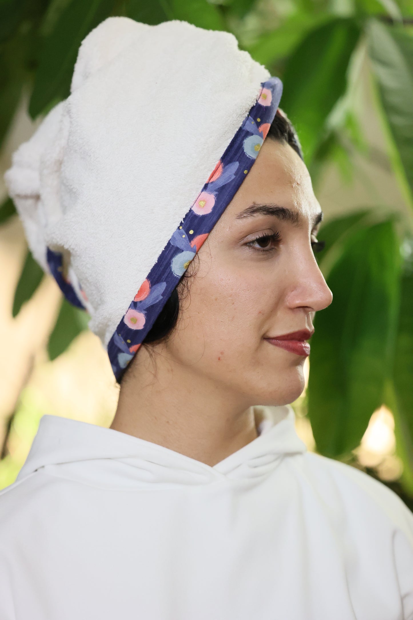 Sanaz wears a golden night white hair towel