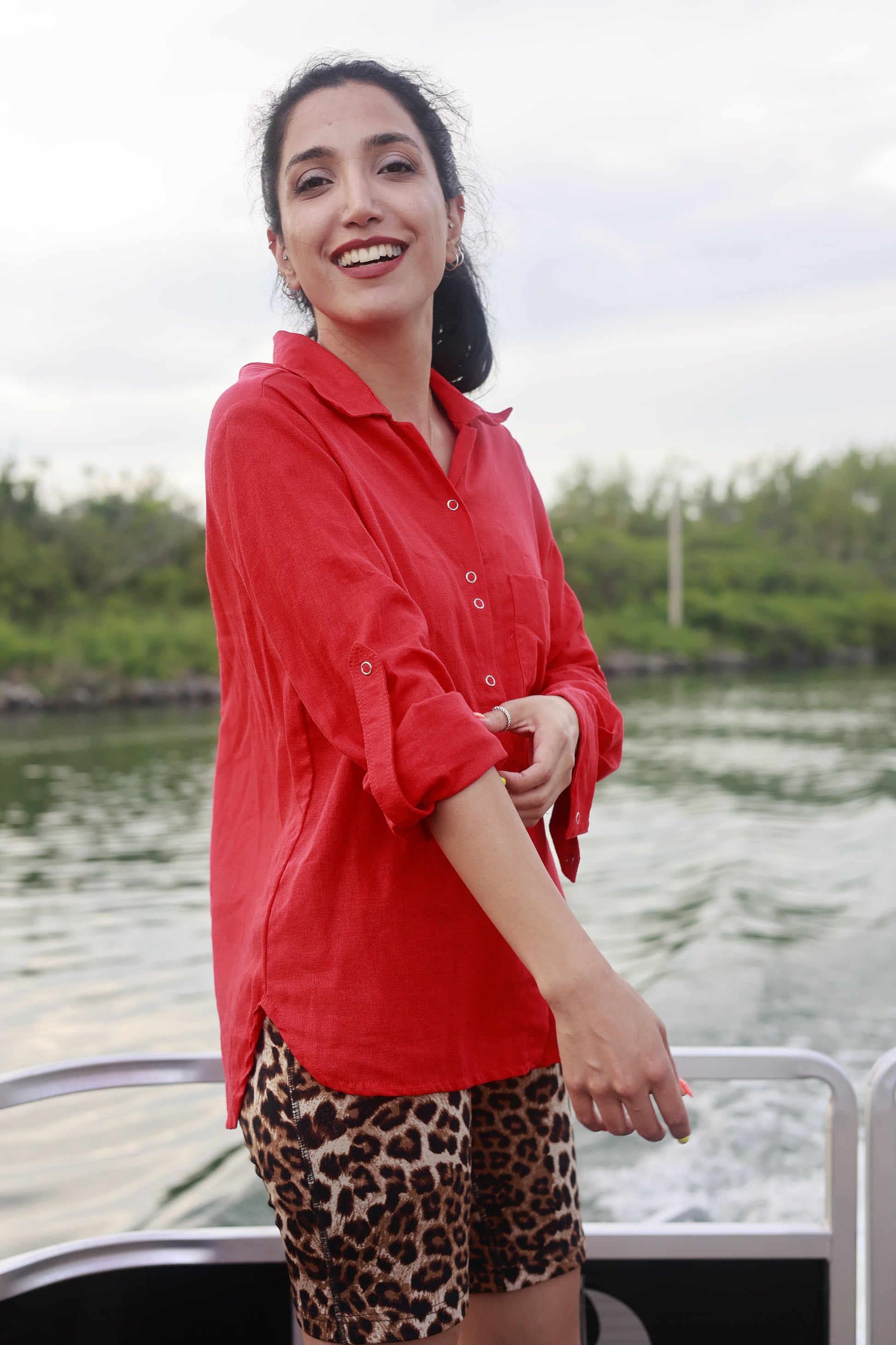 Sanaz wears the Red Linen Shirt with long sleeves by ELZi.
