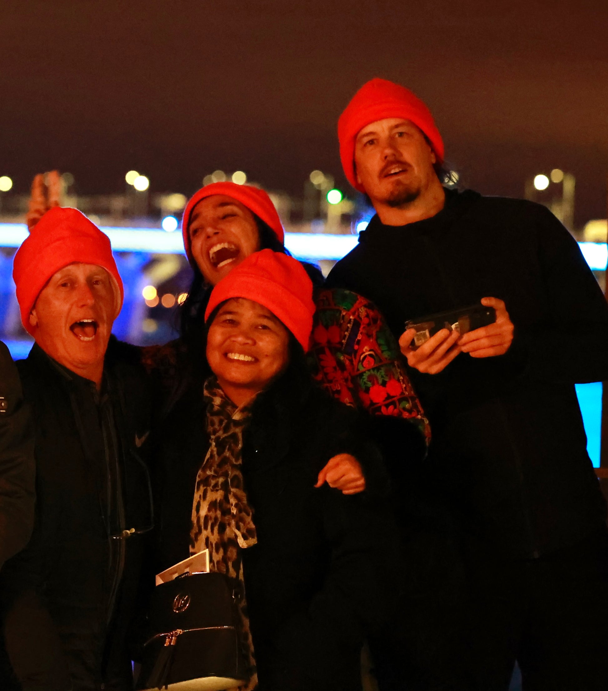 Montreal's Orange hat party in front of the Pont Champlain.