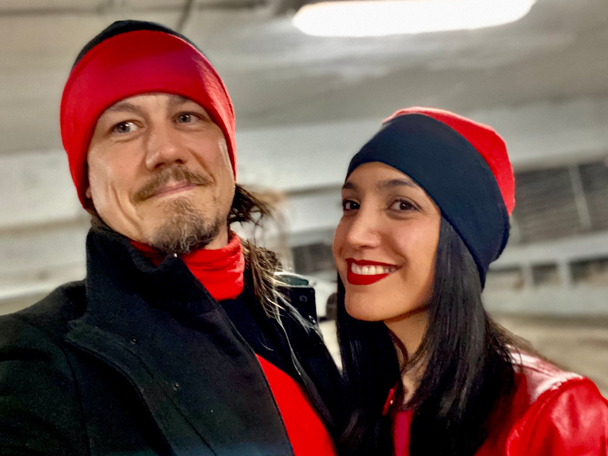Jonathan Brunelle and Sanaz Firouzi rocks the red and black reversible hat by ELZI.ca made from wool.