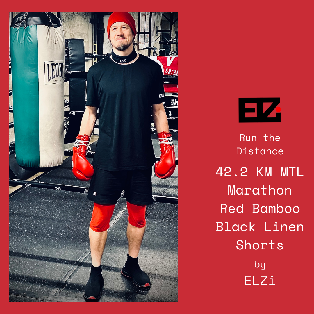 Jonathan wears the 42.2KM mtl marathon black linen with red bamboo liner shorts for boxing at counterback studio in Montreal. 