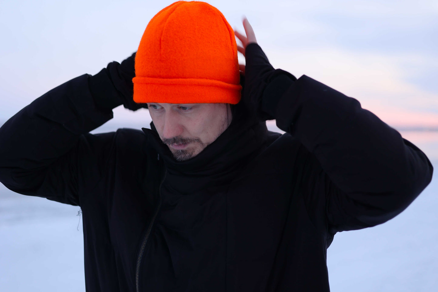 ELZI Orange Wool Hat. Model Jonathan Brunelle