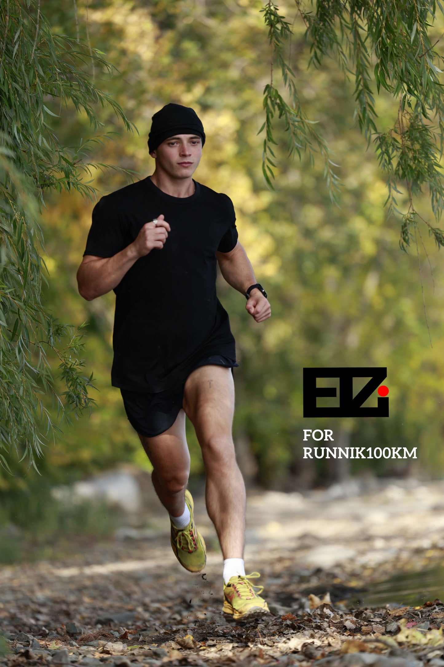 ELZI for runnik100km t-shirt. Black Merino Wool T-shirt for ultra runners. Zero chafing, no itchiness. Trail Runs in Montreal. Running by the st-lawrence river.  Photography by Jonathan Brunelle.